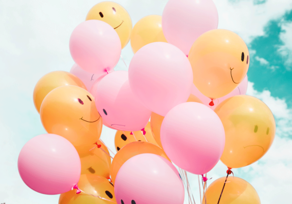 balloons happy and sad faces by hybrid unsplash
